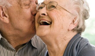 Couple_residents_at_Generations_with_a _kiss_ on_ the _cheek