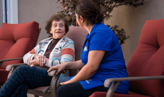 nurse-talking-to-elderly-woman