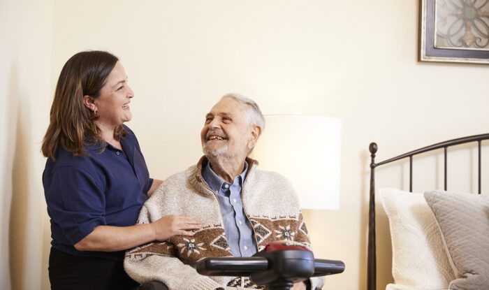 man-in-wheelchair-with-nurse