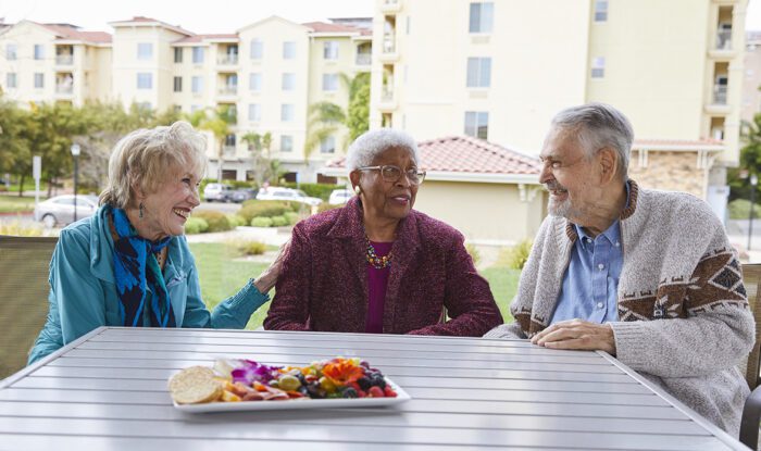 friends-talking-with-food-on-table