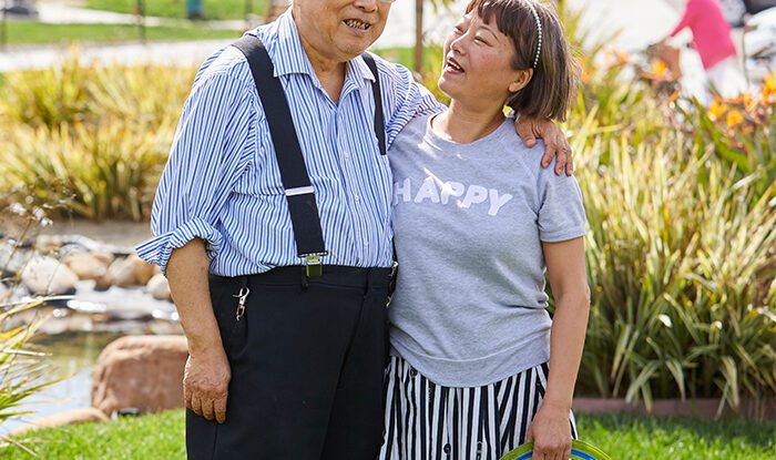 couple standing next to each other in assisted living