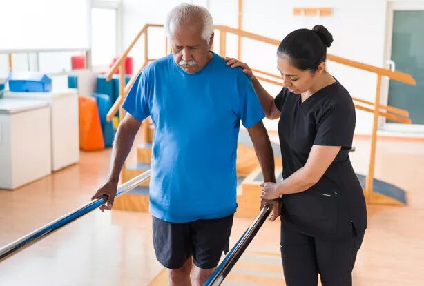 post_acute_care_a_worker_assisting_elderly_man
