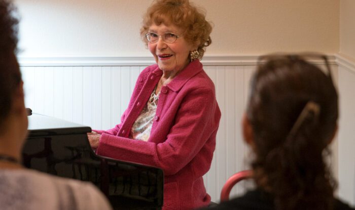 elderly-woman-playing-piano