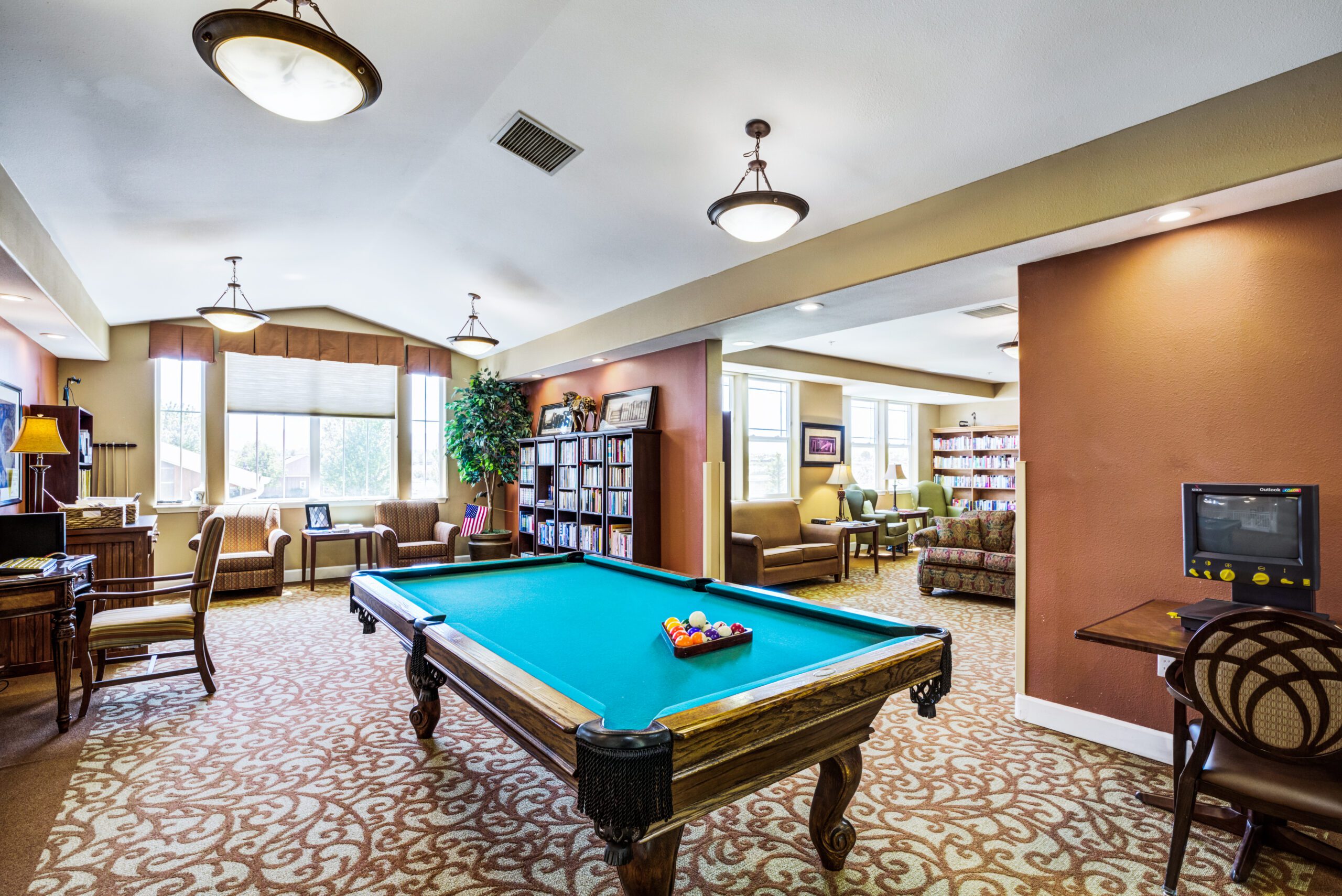 Senior living play room with billiards
