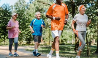 a group of elderly people go for a light jog for vitality