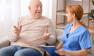 A senior patient discusses mental health with his provider