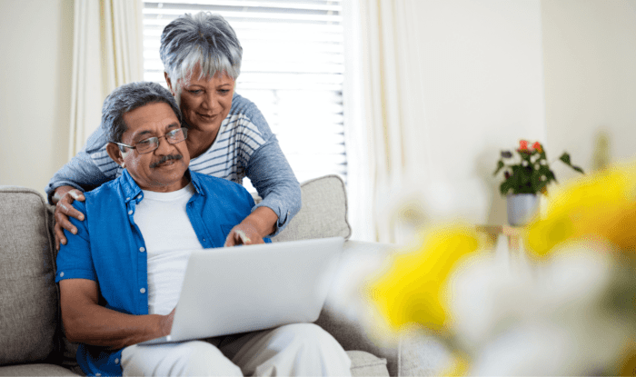 A senior couple caregiving and using technology, Memory Care, Montrose, Colorado